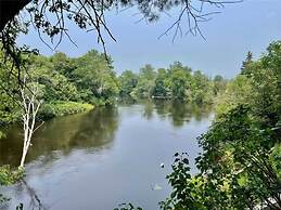 Whispering Pines Riverside Getaway
