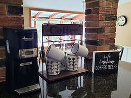 Whispering Pines Riverside Getaway