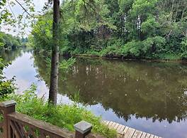 Whispering Pines Riverside Getaway