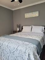 Whispering Pines Riverside Getaway