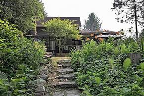 Whispering Pines Riverside Getaway