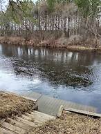 Whispering Pines Riverside Getaway