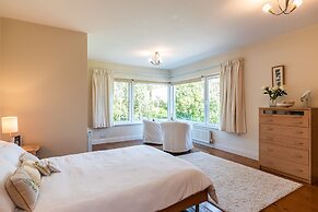 A Split-level Spacious Home With sea Mountain Views