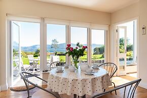 A Split-level Spacious Home With sea Mountain Views