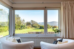 A Split-level Spacious Home With sea Mountain Views