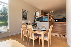 A Split-level Spacious Home With sea Mountain Views