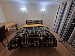 Rooms with Shared Bath Kitchen Parking