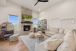 Upscale Waterfront Estate With Mountain Sunset Views