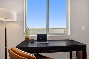 Upscale Waterfront Estate With Mountain Sunset Views