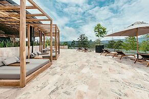 The Brown, Guatape, Autograph Collection