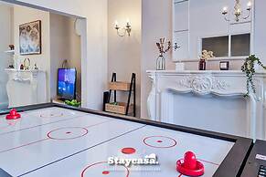 White Cozy House With Pool Table Game Room