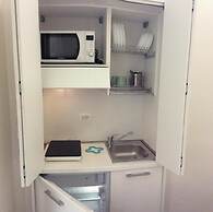 Room in Apartment - Small Charming Suites