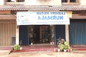 SPOT ON 92569 Anto Homestay SyariahNearPelabuhan Feri Harbor Bay