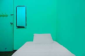 SPOT ON 92186 Penginapan LorraNearPasar Oleh Oleh