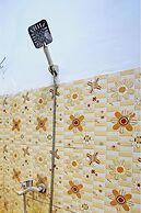 SPOT ON 92452 Griya Sandi Residence Family NearPantai Boom