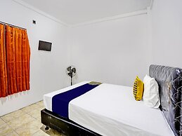 SPOT ON 92452 Griya Sandi Residence Family NearPantai Boom