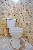 SPOT ON 92452 Griya Sandi Residence Family NearPantai Boom