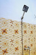 SPOT ON 92452 Griya Sandi Residence Family NearPantai Boom