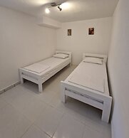 Four Bedroom apt w Patio Close to Beach and Center