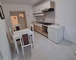 Four Bedroom apt w Patio Close to Beach and Center