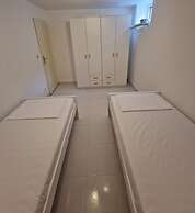 Four Bedroom apt w Patio Close to Beach and Center