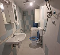 Four Bedroom apt w Patio Close to Beach and Center