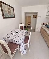 Four Bedroom apt w Patio Close to Beach and Center