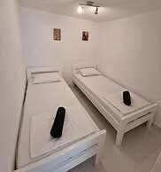 Four Bedroom apt w Patio Close to Beach and Center