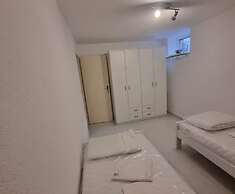 Four Bedroom apt w Patio Close to Beach and Center