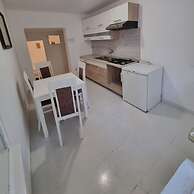 Four Bedroom apt w Patio Close to Beach and Center