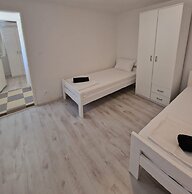 Four Bedroom apt w Patio Close to Beach and Center