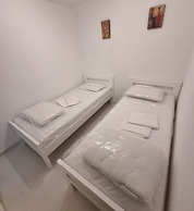 Four Bedroom apt w Patio Close to Beach and Center