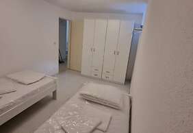 Four Bedroom apt w Patio Close to Beach and Center