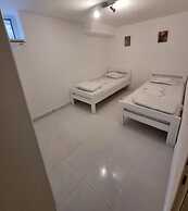 Four Bedroom apt w Patio Close to Beach and Center