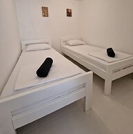 Four Bedroom apt w Patio Close to Beach and Center