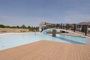 Homely Flat With Private Garden and Common Pool