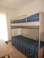 Homely Flat With Private Garden and Common Pool