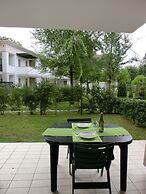 Homely Flat With Private Garden and Common Pool