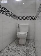 SPOT ON 92822 Finest House Near Amplas Bus Terminal