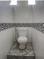 SPOT ON 92822 Finest House Near Amplas Bus Terminal