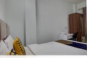 SPOT ON 92822 Finest House Near Amplas Bus Terminal