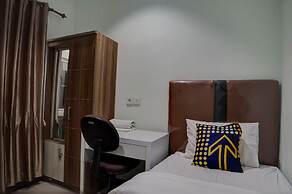 SPOT ON 92822 Finest House Near Amplas Bus Terminal