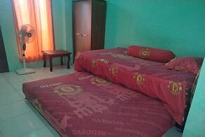 SPOT ON 92839 Nany Asoka Syariah Near Anyong Cafe Studio