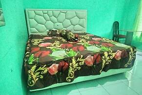 SPOT ON 92839 Nany Asoka Syariah Near Anyong Cafe Studio