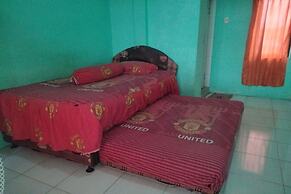 SPOT ON 92839 Nany Asoka Syariah Near Anyong Cafe Studio