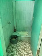 SPOT ON 92839 Nany Asoka Syariah Near Anyong Cafe Studio