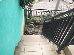 SPOT ON 92839 Nany Asoka Syariah Near Anyong Cafe Studio