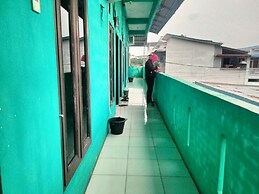 SPOT ON 92839 Nany Asoka Syariah Near Anyong Cafe Studio