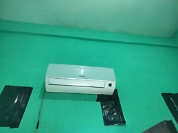 SPOT ON 92839 Nany Asoka Syariah Near Anyong Cafe Studio