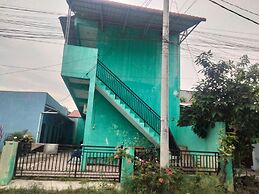 SPOT ON 92839 Nany Asoka Syariah Near Anyong Cafe Studio